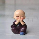 Load image into Gallery viewer, Webelkart Premium Buddha Child Monk Set of 4 Statue Figurines Home Decor,Buddha Showpiece for Home Decor, Car Dashboard,Table Top Decoration Item for Home