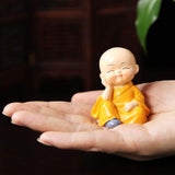 Load image into Gallery viewer, Webelkart Premium Buddha Child Monk Set of 4 Statue Figurines Home Decor,Buddha Showpiece for Home Decor, Car Dashboard,Table Top Decoration Item for Home