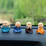 Load image into Gallery viewer, Webelkart Premium Buddha Child Monk Set of 4 Statue Figurines Home Decor,Buddha Showpiece for Home Decor, Car Dashboard,Table Top Decoration Item for Home