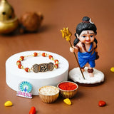 Load image into Gallery viewer, Webelkart Premium Rudraksha Rakhi for Brother Gift Combo - Little Baal Shiv Idol Murti For Home Decor, Rakhis Combo for Rakshabandhan With Greeting Card and Roli Chawal