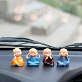 Load image into Gallery viewer, Webelkart Premium Buddha Child Monk Set of 4 Statue Figurines Home Decor,Buddha Showpiece for Home Decor, Car Dashboard,Table Top Decoration Item for Home
