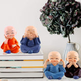 Load image into Gallery viewer, Webelkart Premium Buddha Child Monk Set of 4 Statue Figurines Home Decor,Buddha Showpiece for Home Decor, Car Dashboard,Table Top Decoration Item for Home