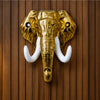 Load image into Gallery viewer, Webelkart Premium Metal Golden Elephant Head Wall Decor with White Tusks | Luxury Wall Hanging Sculpture | Modern Home, Office &amp; Temple Decoration | Gold Finish Elephant Wall Art (5" Inches)
