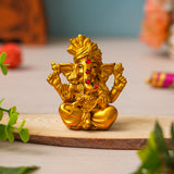 Load image into Gallery viewer, Webelkart Premium Golden Lord Ganesha Idol | Resin Ganpati Murti with Red Stone Work | Vastu &amp; Pooja Decorative Showpiece | Home &amp; Office Tabletop Decor Golden Ganesha Idol Statue (3.5" Inches)