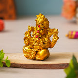 Load image into Gallery viewer, Webelkart Premium Golden Lord Ganesha Idol | Resin Ganpati Murti with Red Stone Work | Vastu &amp; Pooja Decorative Showpiece | Home &amp; Office Tabletop Decor Golden Ganesha Idol Statue (3.5" Inches)