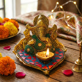 Load image into Gallery viewer, Webelkart Premium Ganesh Idol on Leaf - Lord Ganesha with Diya Decorative,Ganesha Idol for Diwali Festive Decoration &amp; Spiritual Gift Item for Home Decor (4.5" Inches)