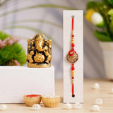 Load image into Gallery viewer, Webelkart Pack of 1Rakhi For Brother And Bhabhi With Ganesha Idol Statue for Home And Car Dashboard- Rakhi Gift Combos