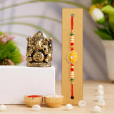 Load image into Gallery viewer, JaipurCrafts New Combo Of Single Rakhi With Ganesha Idol Statue for Home And Car Dashboard- Rakhi for brother and bhabhi- Rakhi Gift Combos - JaipurCrafts