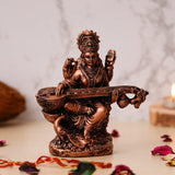 Load image into Gallery viewer, Webelkart Premium Saraswati Playing Veena Polyresin Showpiece for Home and Office Decor-Goddess Saraswati Showpiece| Saraswati Idol Statue for Home ( 7 x 6 x 2.5 Inches)