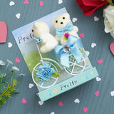 गैलरी व्यूवर में इमेज लोड करें, Webelkart®️ Premium White Plastic Cycle with Teddy Bear and Rose Petals Gift Box for Valentine&#39;s Gift for Girlfriend/Boyfriend/Wife/Husband (Sky Blue)