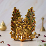 Load image into Gallery viewer, Webelkart Premium Metal Peacock Design Radha Krishna Idol Showpiece for Home Decor with Diya for Puja and Home Decor (6.6 Inches, Gold)